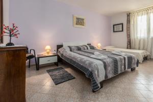 Postel nebo postele na pokoji v ubytování Apartment Macan