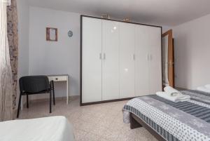 Postel nebo postele na pokoji v ubytování Apartment Macan