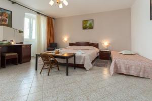 Postel nebo postele na pokoji v ubytování Apartment Macan