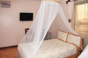 Postel nebo postele na pokoji v ubytování Hotel Marvin + 25 fotografií