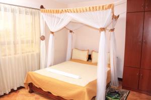 Postel nebo postele na pokoji v ubytování Hotel Marvin