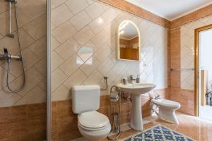 Koupelna v ubytování Apartment Macan