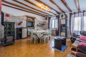 Kuchyň nebo kuchyňský kout v ubytování Apartment Macan