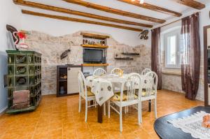 Kuchyň nebo kuchyňský kout v ubytování Apartment Macan