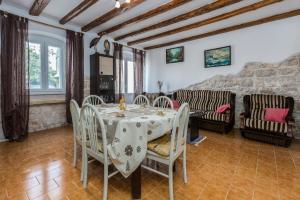 Posezení v ubytování Apartment Macan + 15 fotografií