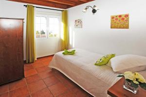 Postel nebo postele na pokoji v ubytování Villa Tojayma + 16 fotografií