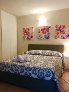 Postel nebo postele na pokoji v ubytování Villa Benaco