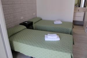 Ein Bett oder Betten in einem Zimmer der Unterkunft Apartamentos Tinerfe Garden