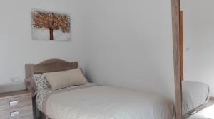 Posteľ alebo postele v izbe v ubytovaní Apartamento Las Tortugas