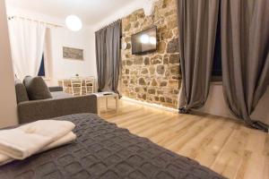 Postel nebo postele na pokoji v ubytování Apartment Stara vrata