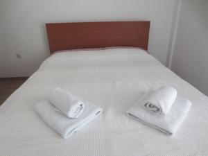 A bed or beds in a room at Studio Anna Veria Center