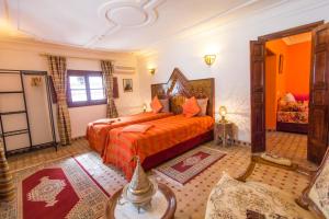 Postel nebo postele na pokoji v ubytování Riad Dar Skalli & SPA