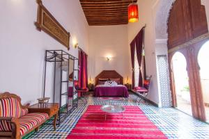Postel nebo postele na pokoji v ubytování Riad Dar Skalli & SPA