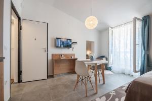 TV a/nebo společenská místnost v ubytování City Vibe Studios