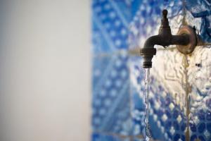 a water faucet with water coming out of it at Dimora La Grazia in Castelvetrano Selinunte