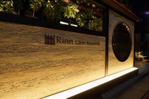 a building with a sign that reads ryan gun kennett at Rinn Gion Kenninji in Kyoto