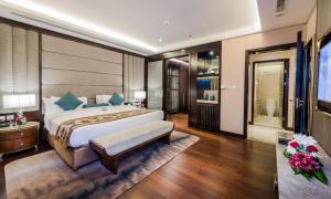 a large bedroom with a large bed and a table at Boudl Al Sahafa in Riyadh +31 photos