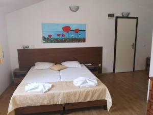 Postel nebo postele na pokoji v ubytování Family Hotel Verona