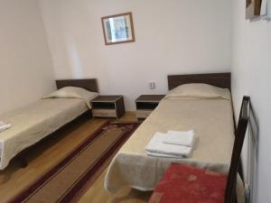 Postel nebo postele na pokoji v ubytování Family Hotel Verona