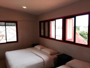 Ліжко або ліжка в номері KT Chinatown Lodge