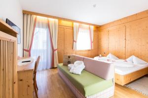 Postel nebo postele na pokoji v ubytování Hotel Goldene Rose