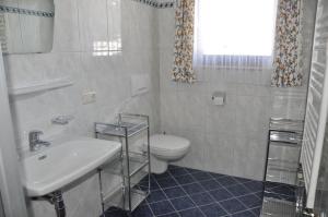 Ванная комната в Pension Mannharthof
