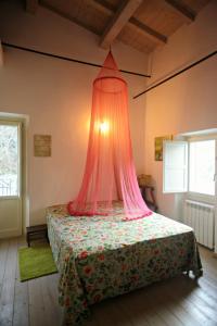Postelja oz. postelje v sobi nastanitve Casa Fisolare