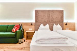 Ein Bett oder Betten in einem Zimmer der Unterkunft Hotel Regina