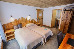 Postel nebo postele na pokoji v ubytování Chalet Monte Bianco