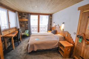 Postel nebo postele na pokoji v ubytování Chalet Monte Bianco