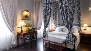 Letto o letti in una camera di Hotel Victoria & Iside Spa