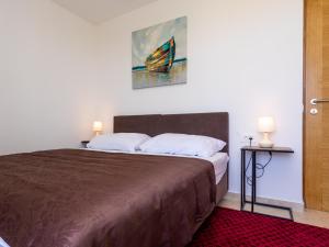 Ein Bett oder Betten in einem Zimmer der Unterkunft Villa Neda