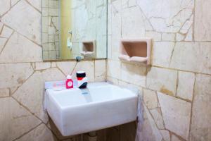 Koupelna v ubytování New Priok Indah Syariah Hotel