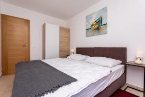 Ein Bett oder Betten in einem Zimmer der Unterkunft Villa Neda