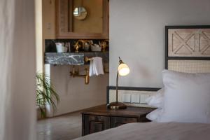 Postel nebo postele na pokoji v ubytování Hotel Hirschen in Freiburg-Lehen
