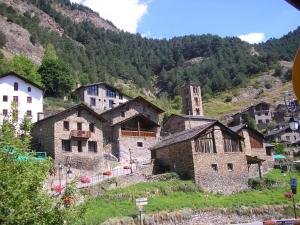 a group of old buildings on a mountain at Casa Fontanella in Pal