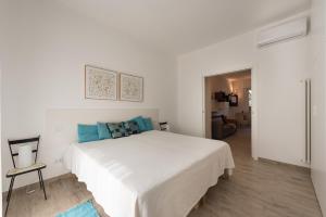 Voodi või voodid majutusasutuse Modern Flat Alberti Arno River Lift & Terraces toas