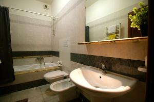 Een badkamer bij Apt Riviera degli Haethey