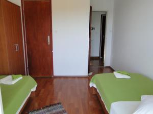 Postel nebo postele na pokoji v ubytování Apartments Josipa