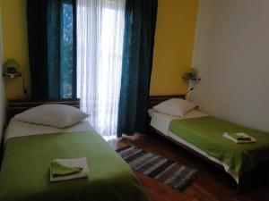 Postel nebo postele na pokoji v ubytování Apartments Josipa