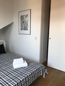 Posteľ alebo postele v izbe v ubytovaní Apartament "WARSZAWA"