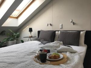 Posteľ alebo postele v izbe v ubytovaní Apartament "WARSZAWA"