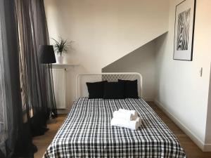 Posteľ alebo postele v izbe v ubytovaní Apartament "WARSZAWA"
