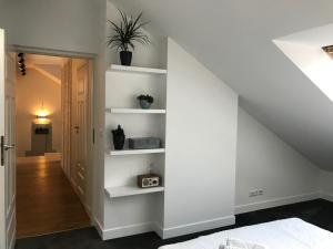 Posteľ alebo postele v izbe v ubytovaní Apartament "WARSZAWA"