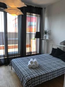 Posteľ alebo postele v izbe v ubytovaní Apartament "WARSZAWA"