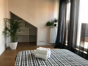 Posteľ alebo postele v izbe v ubytovaní Apartament "WARSZAWA"