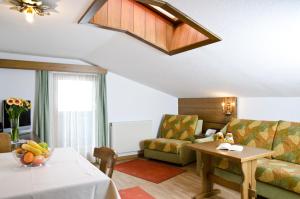 Posedenie v ubytovaní Berghotel Rasis