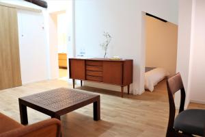 Postel nebo postele na pokoji v ubytování Auberge AZABU