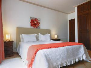 Rúm í herbergi á Residencia Julio