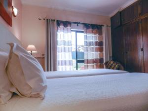 Rúm í herbergi á Residencia Julio